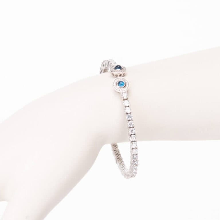 Bracciale tennis semirigido zirconi corona cabochon zaffiro 1