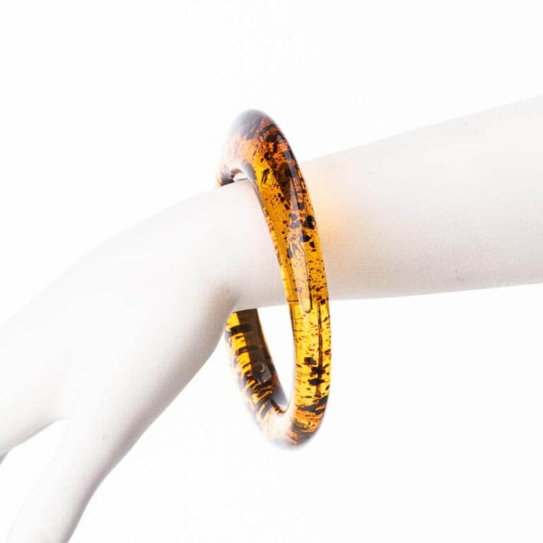 Bracciale rigido sottile resina color ambra nero fantasia animalier 1