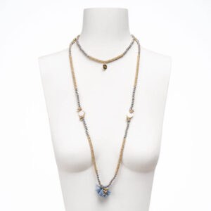 Collana lunga filo cotone color azzurro elementi oro nappina